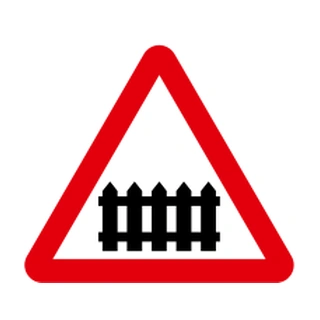Level crossing without barrier or gate ahead